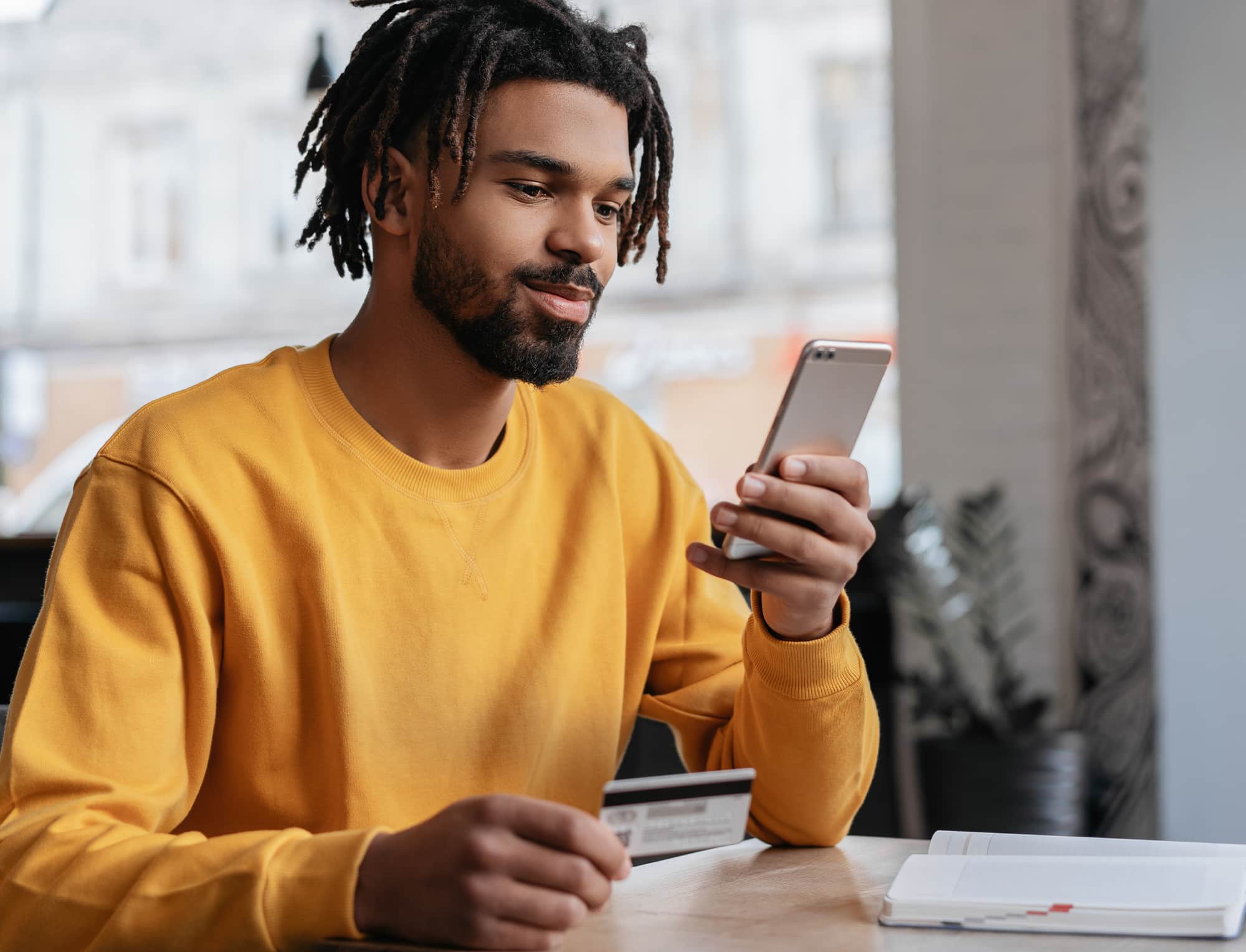 a man holding a phone