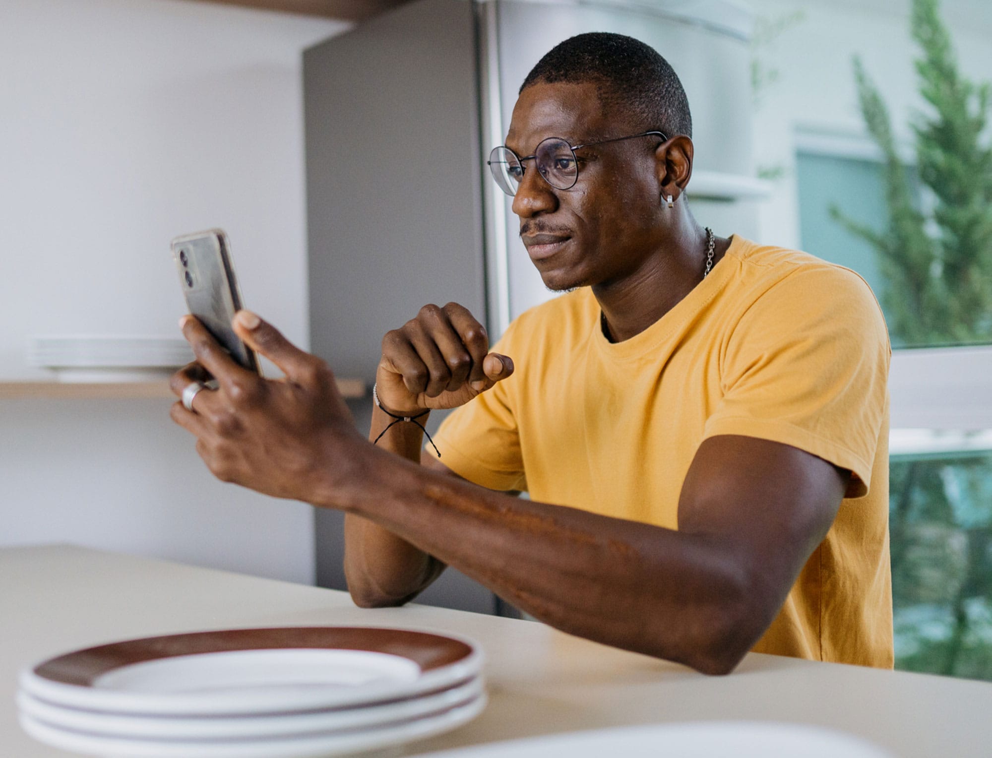 a man holding a plate of food